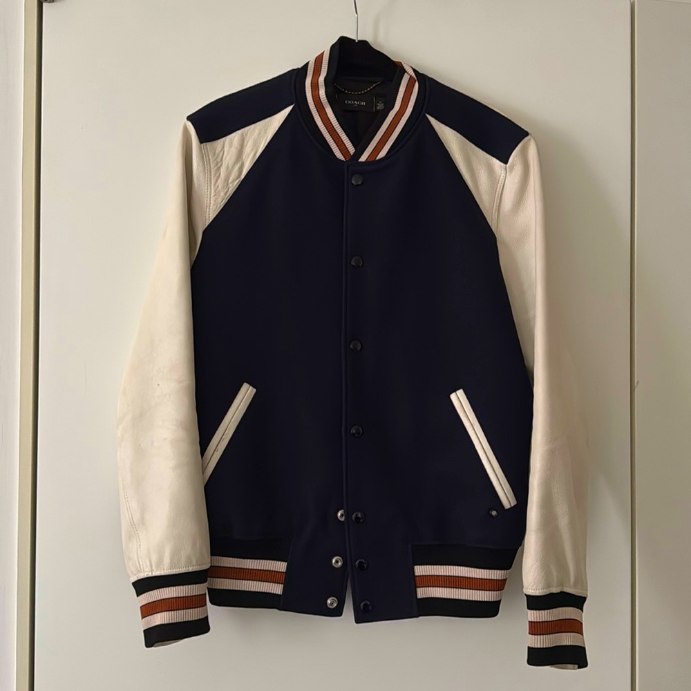 Coach lether sleeves varsity jacket in great condition